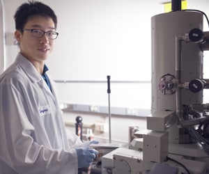 TE scientist in China working on materials science equipment